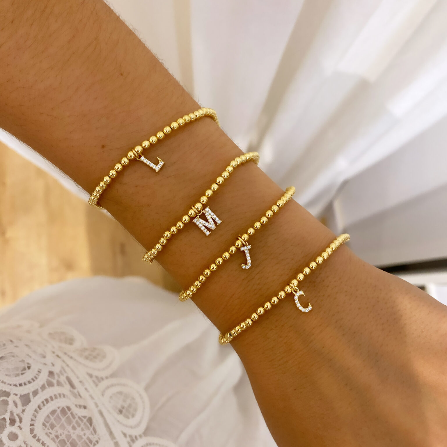 pulsera letras circonitas